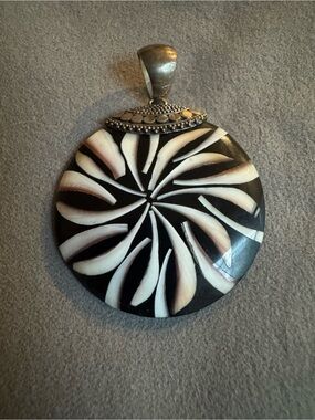Vintage Indonesian designer starburst disc pendant likely crafted by Merav.